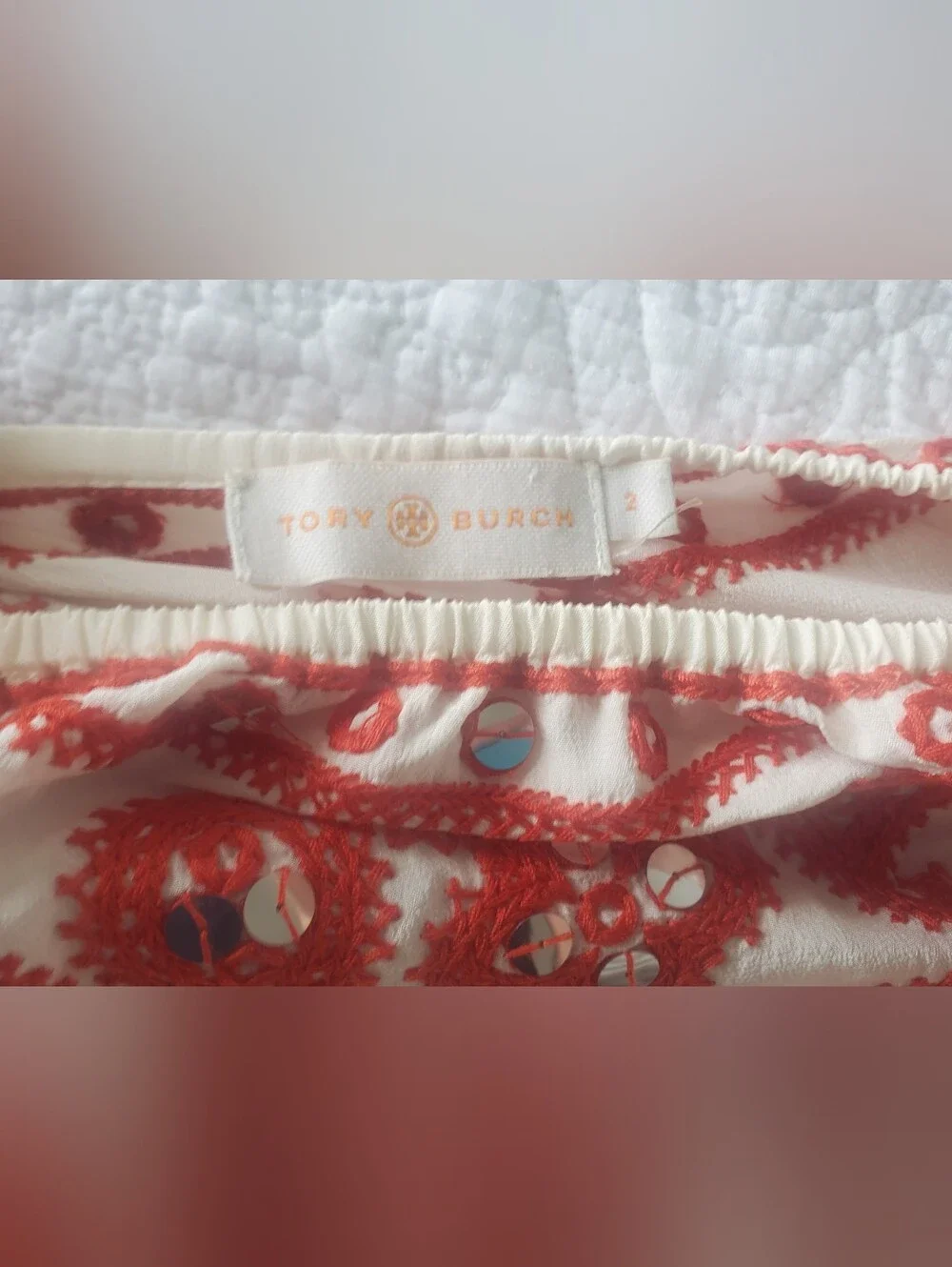 Tory Burch features intricate